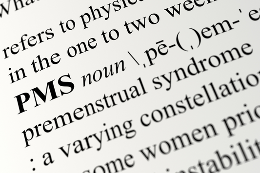 Das Wort PMS prämenstruelles Syndrom
