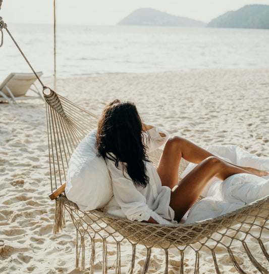Wie beeinflussen Sommer und Reisen den Zyklus und PMS?